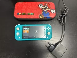 Console Nintendo Switch Lite turquoise, en TBE, très peu servi.