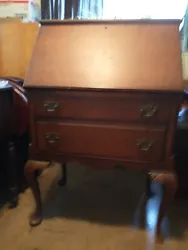 Antique Secretary Desk.  Not perfect. The foot is broken as you see, I have some not all of it. Thank you.