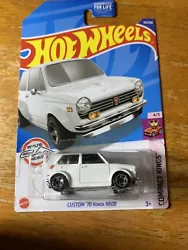 Discover the thrill of this 2022 Hot Wheels toy car, part of the Compact Kings series. This 1:64 scale diecast model of...