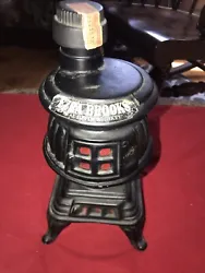 EZRA BROOKS Bottle Decanter - Pot Belly Stove - No Liquor. Condition is Used. Shipped with DGM SmartMail Ground.
