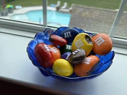 These M&M painted rocks are a must-have for any art collector or home decorator. The set of 5 rocks comes in a variety...