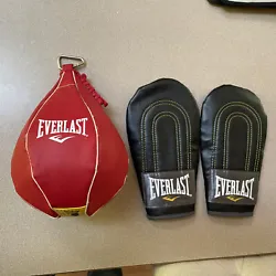 Everlast Red Vinyl 4# Speed Bag And Brand Pair Of Sparring Gloves Combo. Both are VERY lightly used. You can see a few...