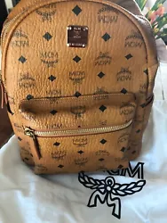 MCM small start side stud backpack Pre owned and comes with dustbag Color is cognac Used a few times in great...