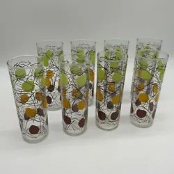 The round glasses feature a fun polka dot pattern in a variety of colors, perfect for a mid-century modern style.