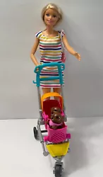 Barbie Doll Pet Stroller Lot includes: 2 Puppy Dogs, Pet Stroller, Barbie Doll and Camera. In good used condition. See...