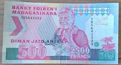 Valeur 2500 francs ou 500 ariary (500 MGA). DIMAN JATO ARIARY. cinq-cents Ariary. Banque Centrale de Madagascar. Type...