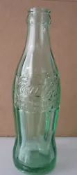 For consideration I have from my parents estate this Antique Glass Coca Cola Bottle Marked Springfield, MASS as shown...