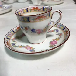 Minton Bone China Demitasse Cup & Saucer A-4807 Rose. This is in good condition with no cracks or chips. The gold is...