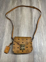 Purse is VERY dirty on the inside. Will need to be professionally cleaned. Please be sure to examine the photos of the...