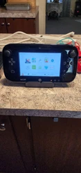 nintendo wii u console bundle. Includes console,game pad,4 complete controllers, (red one is missing the back battery...