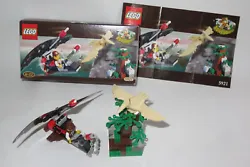 Boîte de Legos 5921 datant de 2000 contient un petit personnage sur son planeur qui cherche à attraper un pteranodon...