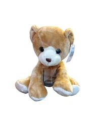 This and That International Bear Plush Sitting Stuffed Animal Toy With Ribbon is the perfect addition to your stuffed...