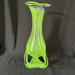 Very unique and prettyNo breakage, chips or cracks13 inches tall5 1/4 inches at biggest part acrossBottom is very...