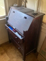 Solid wood. Been in the house for many decades. I do not see any manufacturer. PICK UP ONLY!