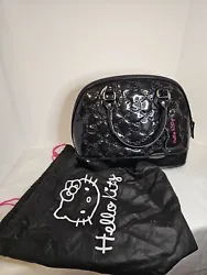 This Loungefly Hello Kitty Tote Bag is a perfect accessory for any Hello Kitty fan. The bag features a black patent...