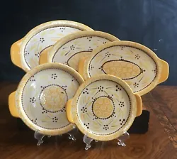 For sale various pieces of Temp-Tations Old World Yellow Presentables Ovenware. Each piece could be a platter or a lid....