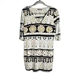This white, black, and gold tunic dress from Harper in size small is a stunning and versatile piece that exudes...