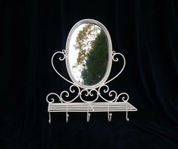 Cream coated. Mirror with shelf. 3 small surface scrapes on left scroll. Good condition -. The item you see for sale,...