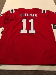 Nike Patriots Edelman Jersey. Youth Large. New W TagsThere is stitching around the name Youth large is a 14/16Smoke...