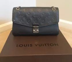 LOUIS VUITTON Saint Germain PM handbag in limited edition studded Platine Monogram Empreinte leather. In outstanding...