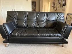 Black faux leather sofa bed. Never used. 72 inches long. 36 inches deep as a sofa. 45 inches wide as a bed.