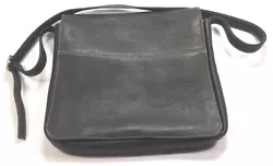 Very good preowned condition with minimal signs of wear. No cuts, scrapes, scuffs noted. Full lenghth interior pocket,...