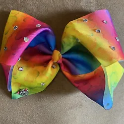 Jo jo siwa bow. New without tags. Beautiful! The gems on it are little hearts.
