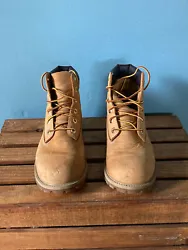 Timberland mens brown work boots in a size 7. Some wear on toes and mark on right boot. Please refer to pictures. Soles...