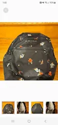 This stylish Jansport backpack features a stunning red rose pattern on a black background. Made with high-quality 100%...