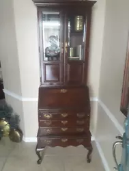Magnificent Ethan Allen Georgian Court secretary desk with separate beveled glass door curio top. Two beveled glass...
