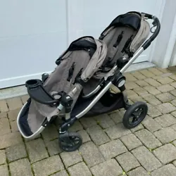 Pre-owned Baby Jogger City Select Double Stroller in Beige. This stroller can be used for one, two, or even three...