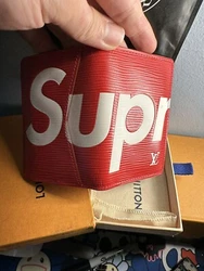 louis-vuitton supreme wallet. Small flaws show on last photo