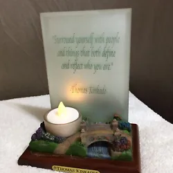This is a great tea light holder made by Thomas Kinkade in 2004. On the bottom of the piece is the Bridge of Hope in...