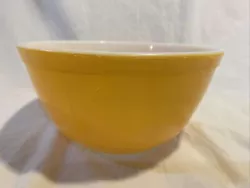 Lt Orange/Dark Yellow Mixing Kitchen Bowl. The bowl is a deep yellow, almost a light orange, it is not a light yellow....
