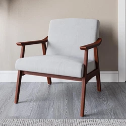 [PLUSH LINEN UPHOLESTRY] Covered in plush linen upholstery, this armchair embodies sophistication and luxury. Finish...