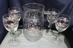 Dainty floral pattern of colorful flowers. Made in France. Pitcher; 8”T holds 48 oz. May contain manufacture flaws....