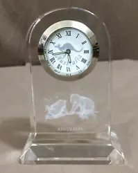 This is a great paperweight from Australia. It has 2 koala bears etched inside, and a kangaroo on the clock face.
