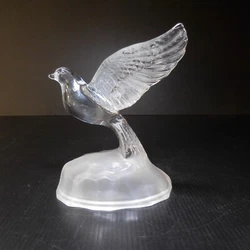 Matières : verre cristal. Couleurs : blanc transparent opaque. Motif animalier : oiseau.