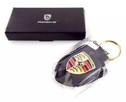 Car Key Chain. Material: Leather. Color: Black. NEW IN PLASTIC.