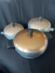 Wear-Ever Aluminum Hallite 6 pc Copper Lids-2 Pots and Double Boiler-Cookware. Really nice old dinner pots, 1 lid is...