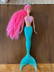 Barbie Mermaid Fantasy Barbie Pink Hair, Moving Arms Flipping Tail.  Tail has small tear near top.  Also top shoulder...