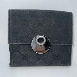 Authentic Gucci Wallet Bi fold Compact GG Canvas. Item is pre-owned and has some fading. Please see photos for wear on...