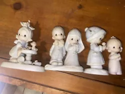 Precious Moments Lot Of 4 Figures. Condition is Used. Shipped with USPS Ground Advantage.