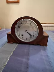 antique garrard oak cased mantle clock. With key and pendulum needs a polish up all seems to be in working order but...