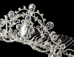 Sparkling and majestic, this silver or gold plated tiara comb sparkles with a lovely pattern of rhinestones making it a...
