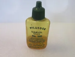 This buy it now auction is for the Pflueger Marvel 380 oil pictured above