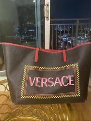 Authentic Versace tote bag in a great condition and dust bag is available.