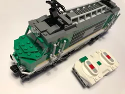 Locomotive provenant de la boite Lego train de marchandise 60198. Avec la télécommande bluetooth, le moteur et la...