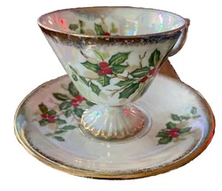 This beautiful tea cup and saucer set from Ucago of Japan is the perfect addition to your Christmas collection. Crafted...