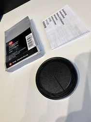 Leica Brand Auto lens Cap D-lux 7, Type 109. Open box. Mint condition. Also fits Panasonic versions of Leica D-Lux 7...